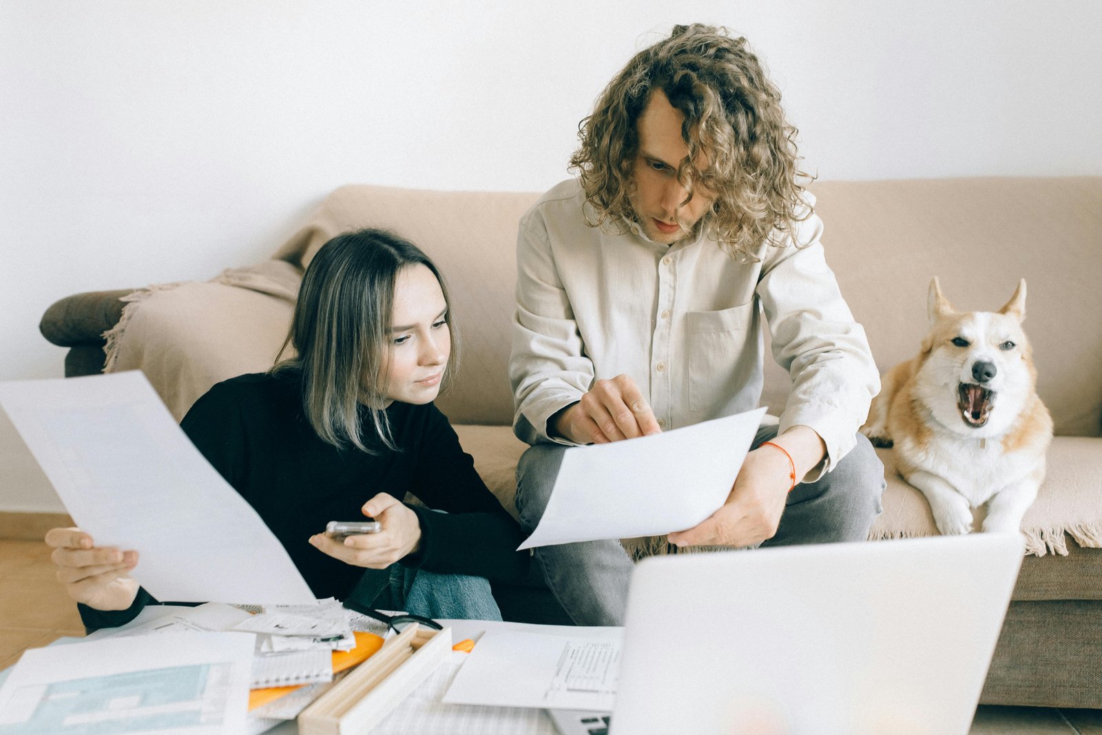 Executor and family reviewing probate property paperwork at home